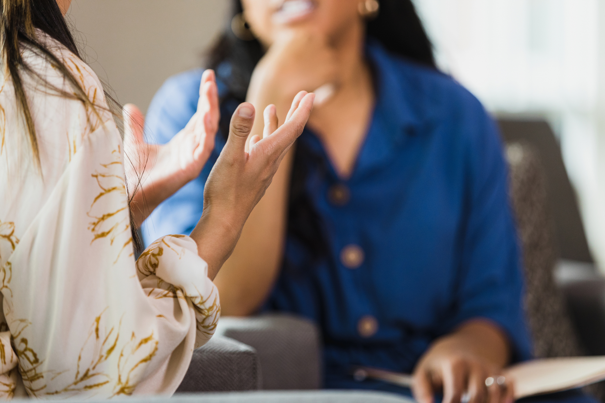 Unrecognizable woman talking with therapist Mommy Makeover in Phoenix, AZ